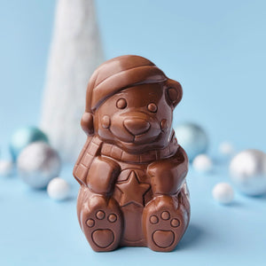 HOLLOW CHRISTMAS BEAR, AVAILABLE FOR PURCHASE IN OUR RETAIL STORES ONLY.
